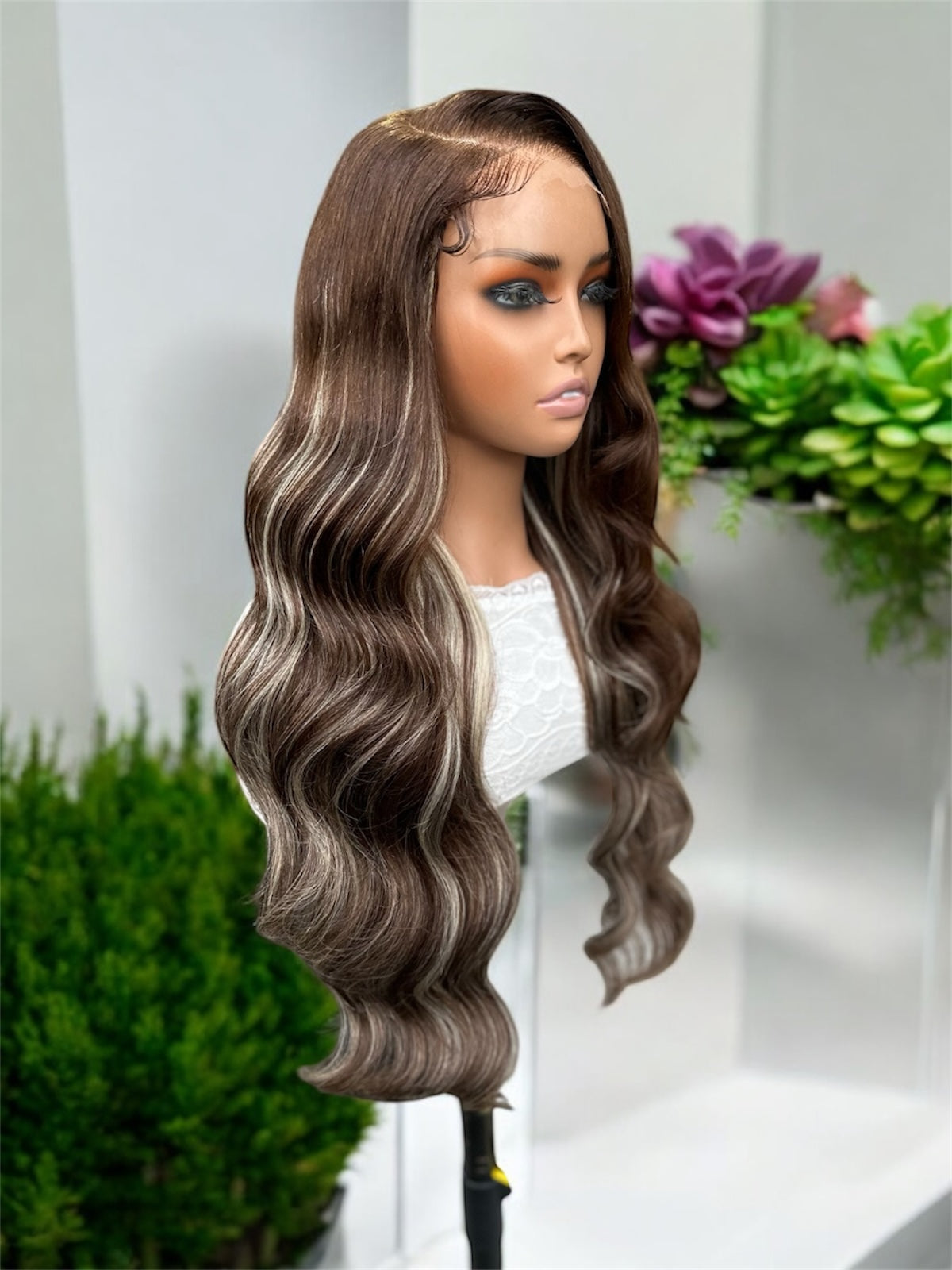 Wavy brown with blonde highlights
