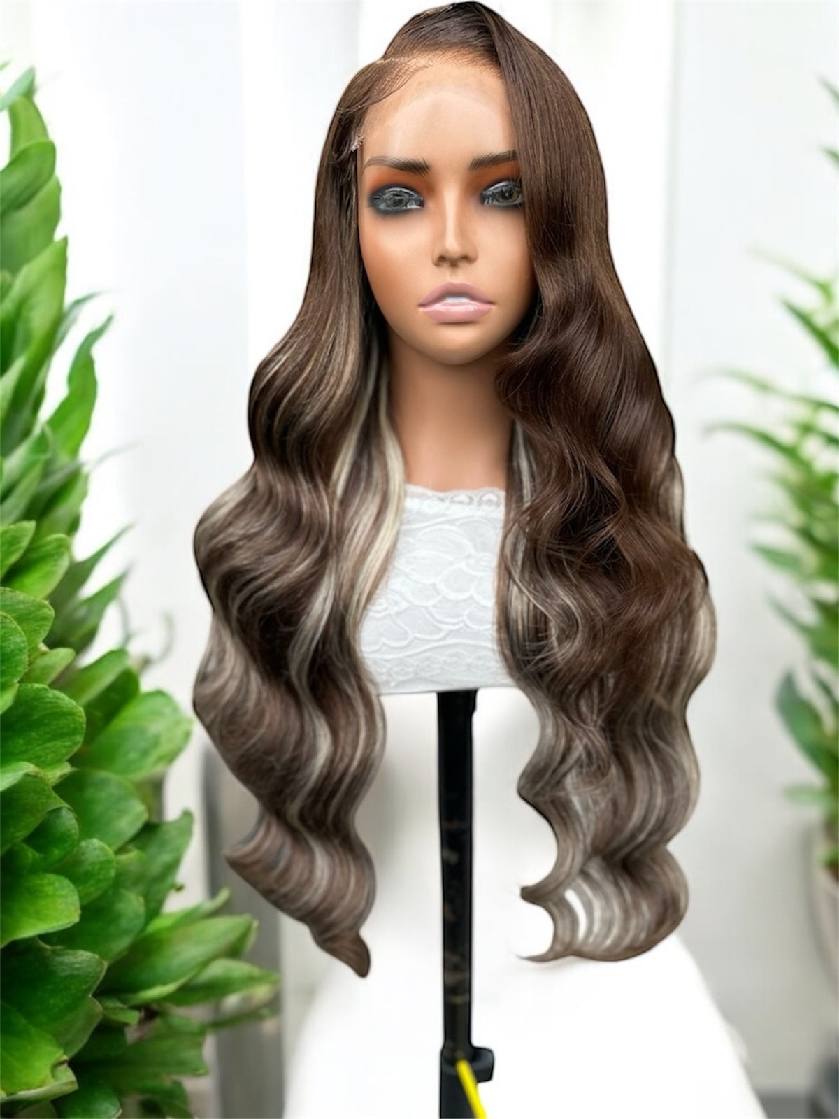 Wavy brown with blonde highlights